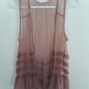 See through peach. Ruffled tank top, vest
